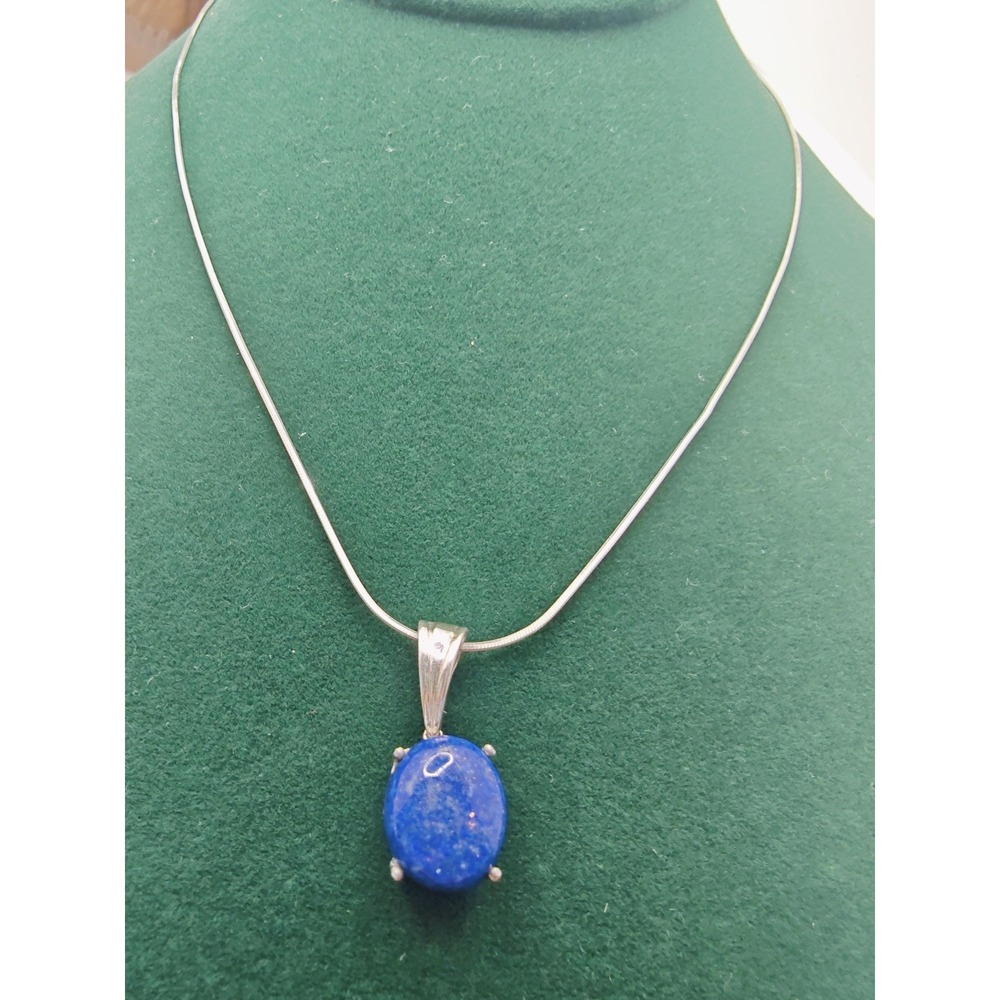 Vintage Artisan Sterling Silver Lapis Lazuli pendant with fine chain.